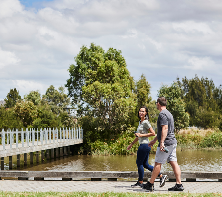Heartford, Donnybrook young couple walking along footpath.