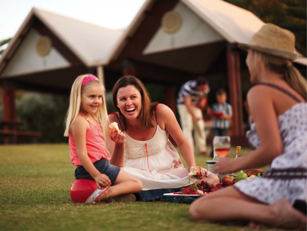 Young friends enjoying a picnic