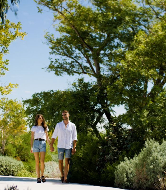 Catalina, Mindarie and Clarkson young couple walking along the foot path