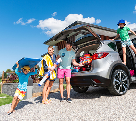Ridgeview, Narangba family of four unpacking the car.
