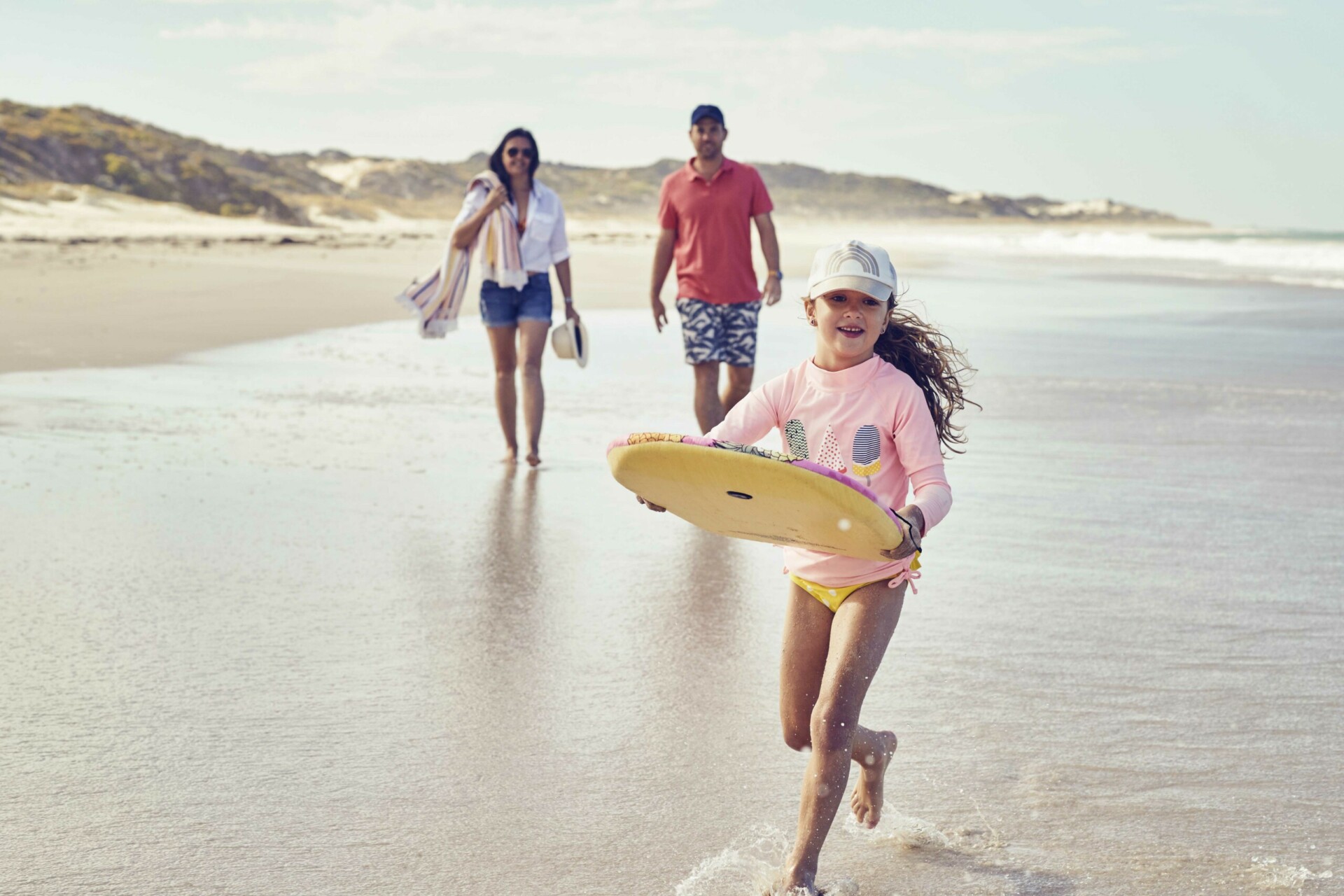 Catalina, Mindarie and Clarkson father, mother and daughter down at the beach