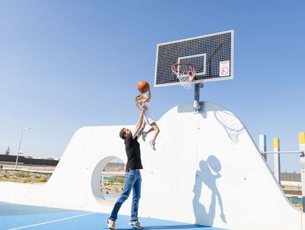 Eden Beach, Jindalee, father and daughter playing basketball