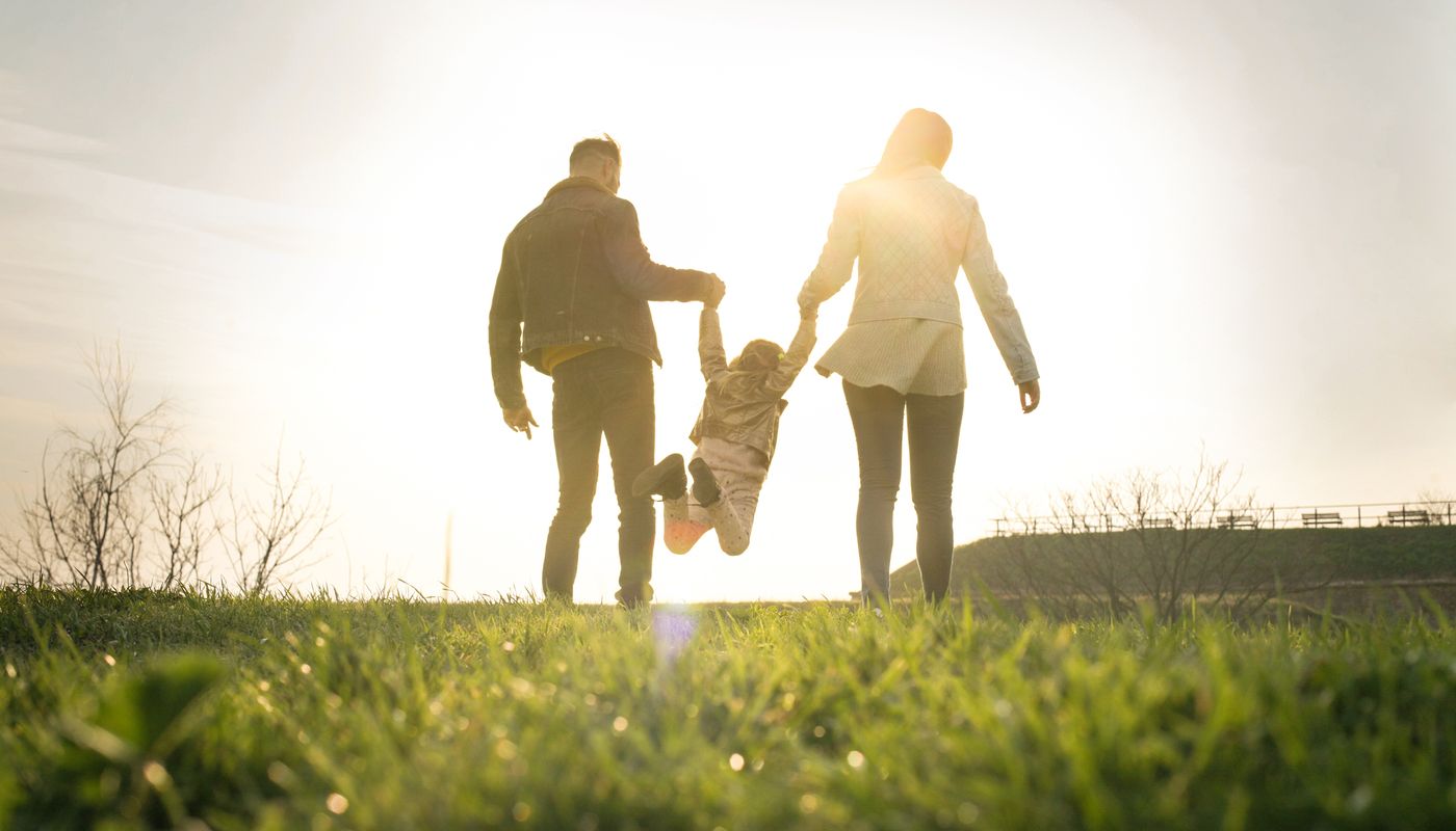 Dalyellup Beach, Dalyellup mother and father holding child's hand