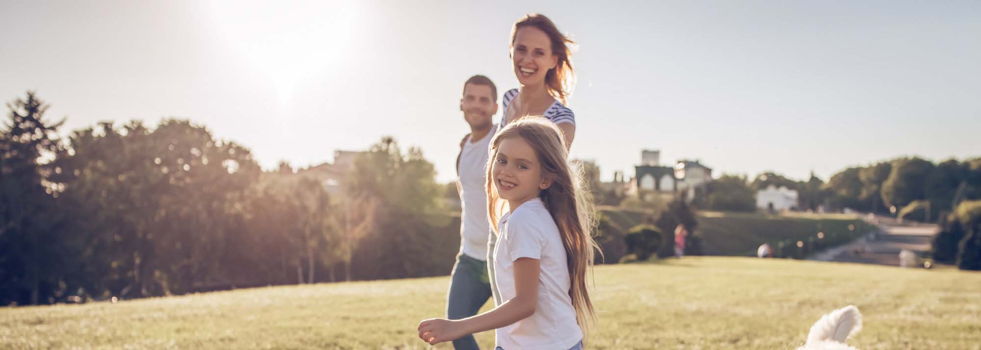 Young family looking at their buying and building options