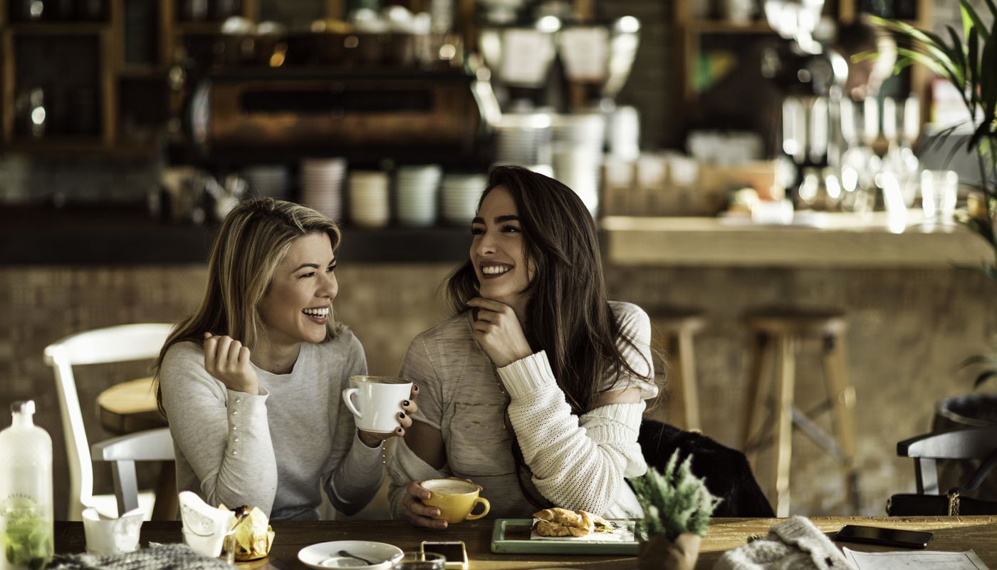 friends chatting while enjoying a coffee in Kwinana