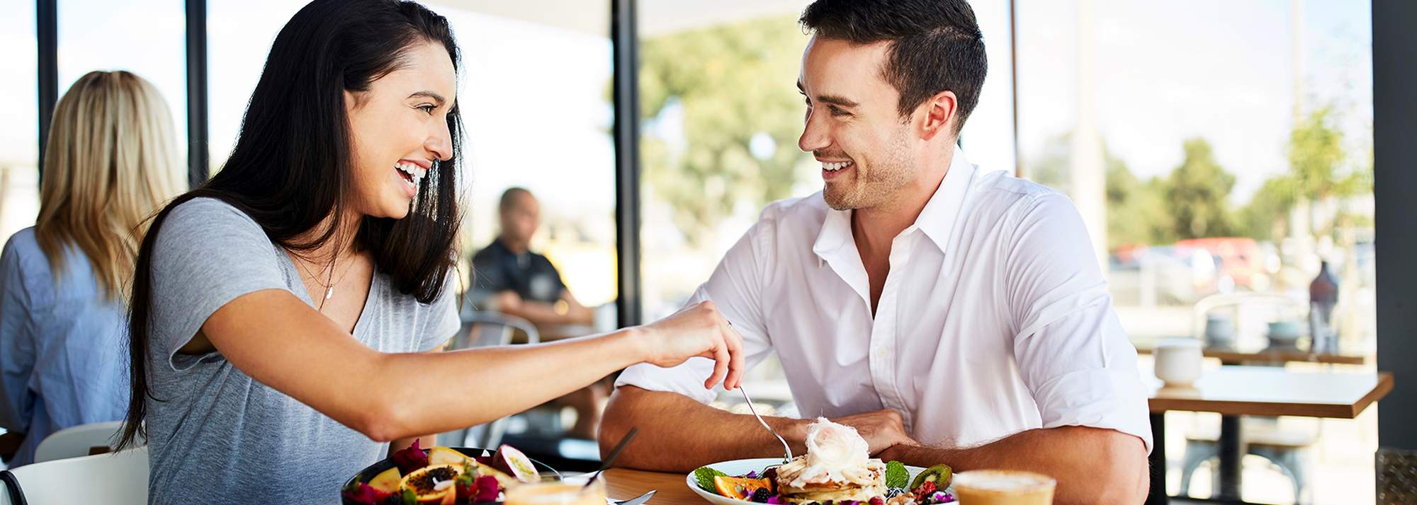 Eden Beach, Jindalee, young couple enjoying a lunch