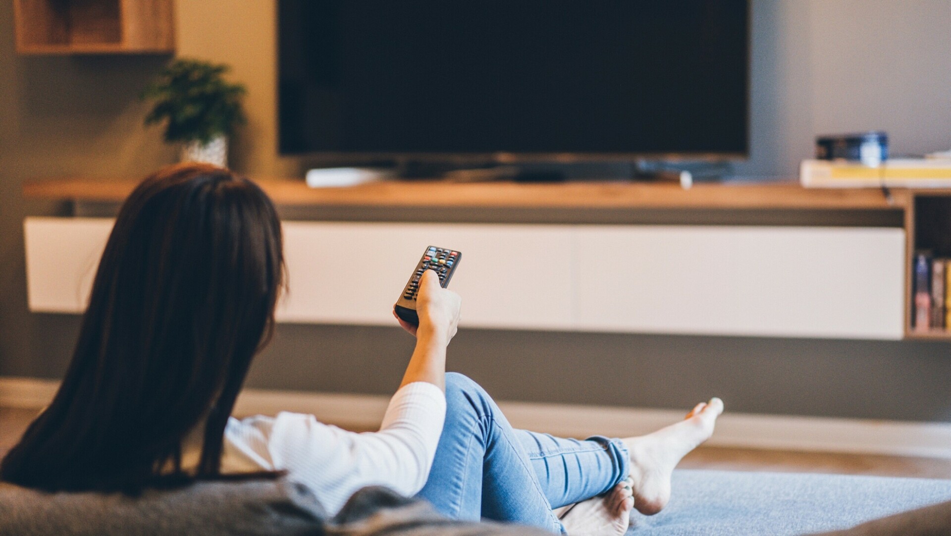 Internet and TV within WA communities, young lady watching tv