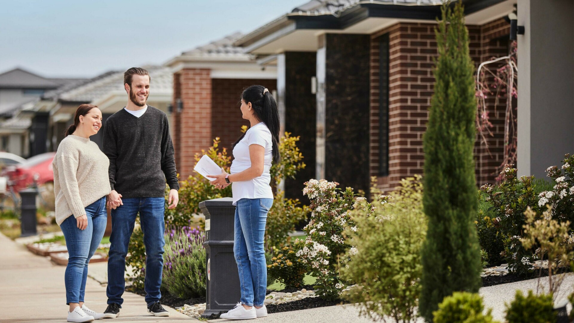 Botanical, Mickleham young couple talking to neighbour.