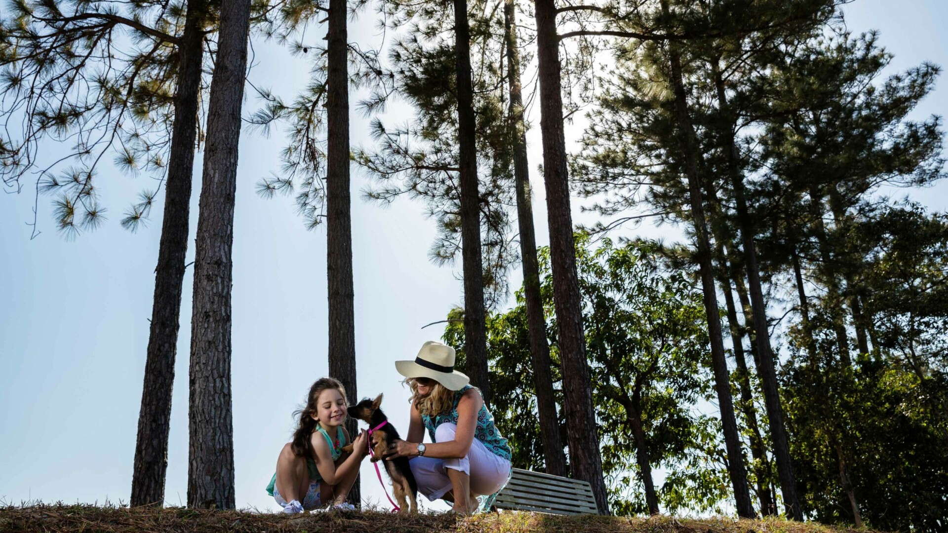 Smithfield Village, Smithfield mother and daughter going for an outdoor nature walk with small dog.
