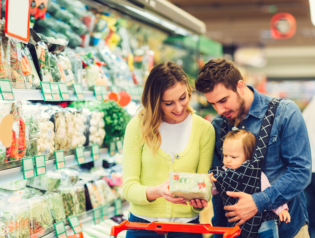 Smithfield Village, Smithfield young family, mother, father and daughter at local grocery store.