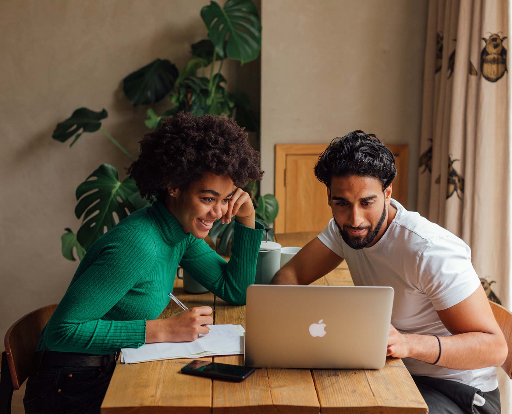 Young couple sorting finances