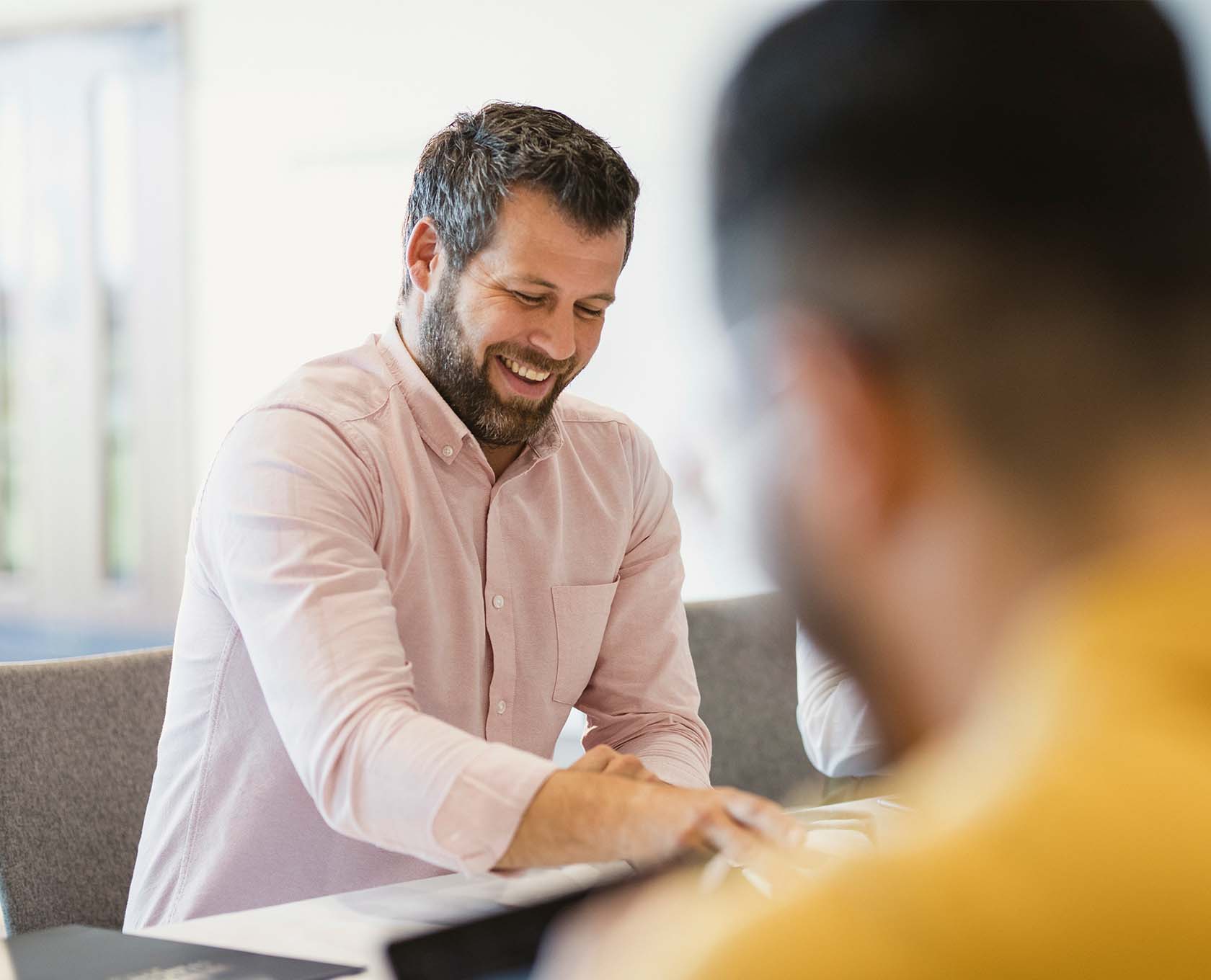 Employees discussing meeting