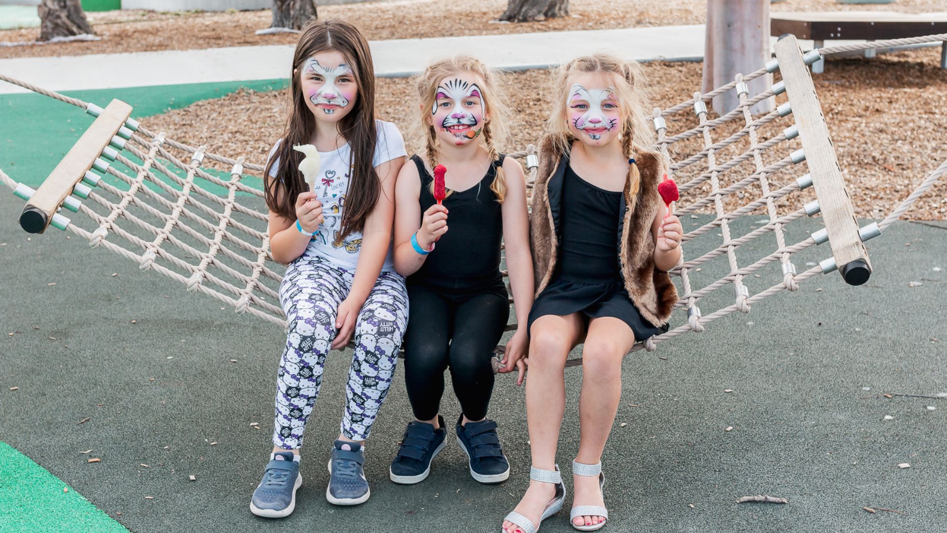 Eating icy poles and face painting at Arcadia