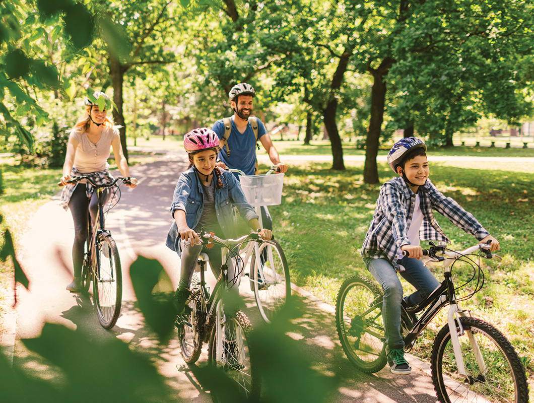 St Helena Place family riding their bike