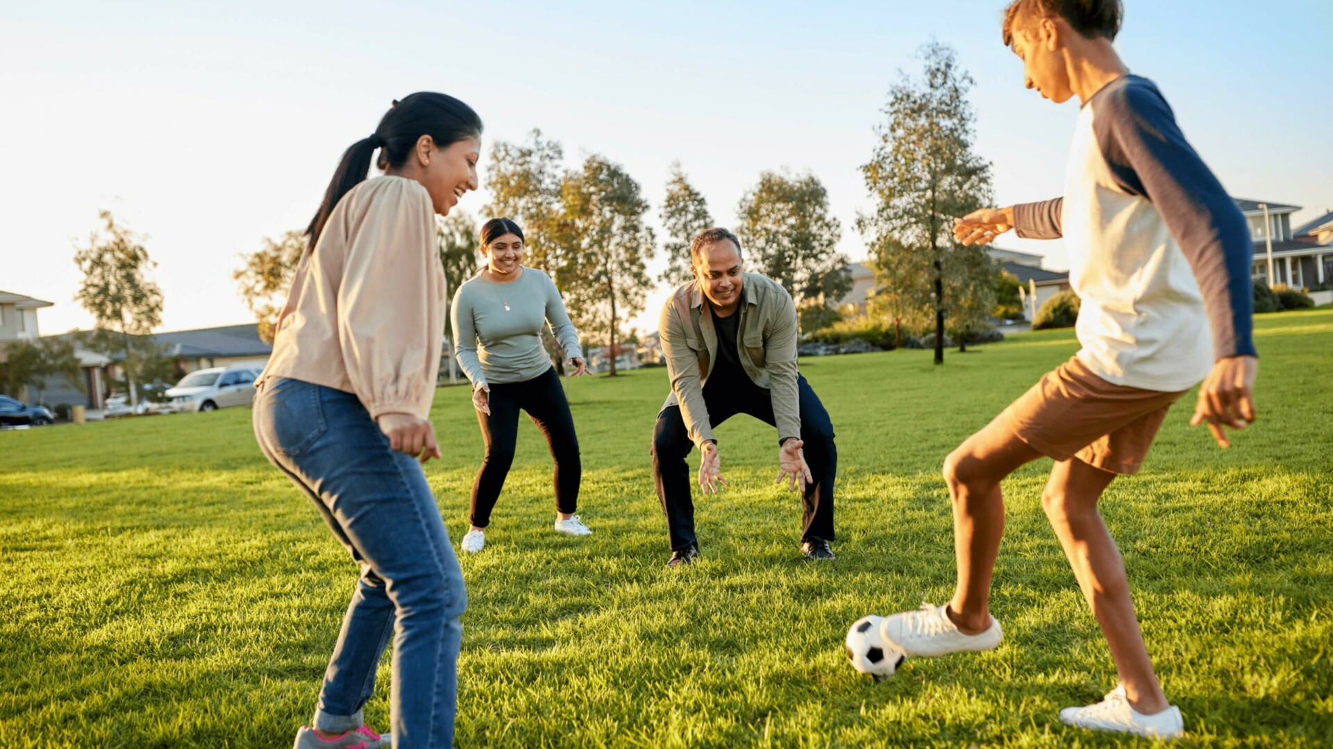 Bluestone, Tarneit young family playing soccer at the park.