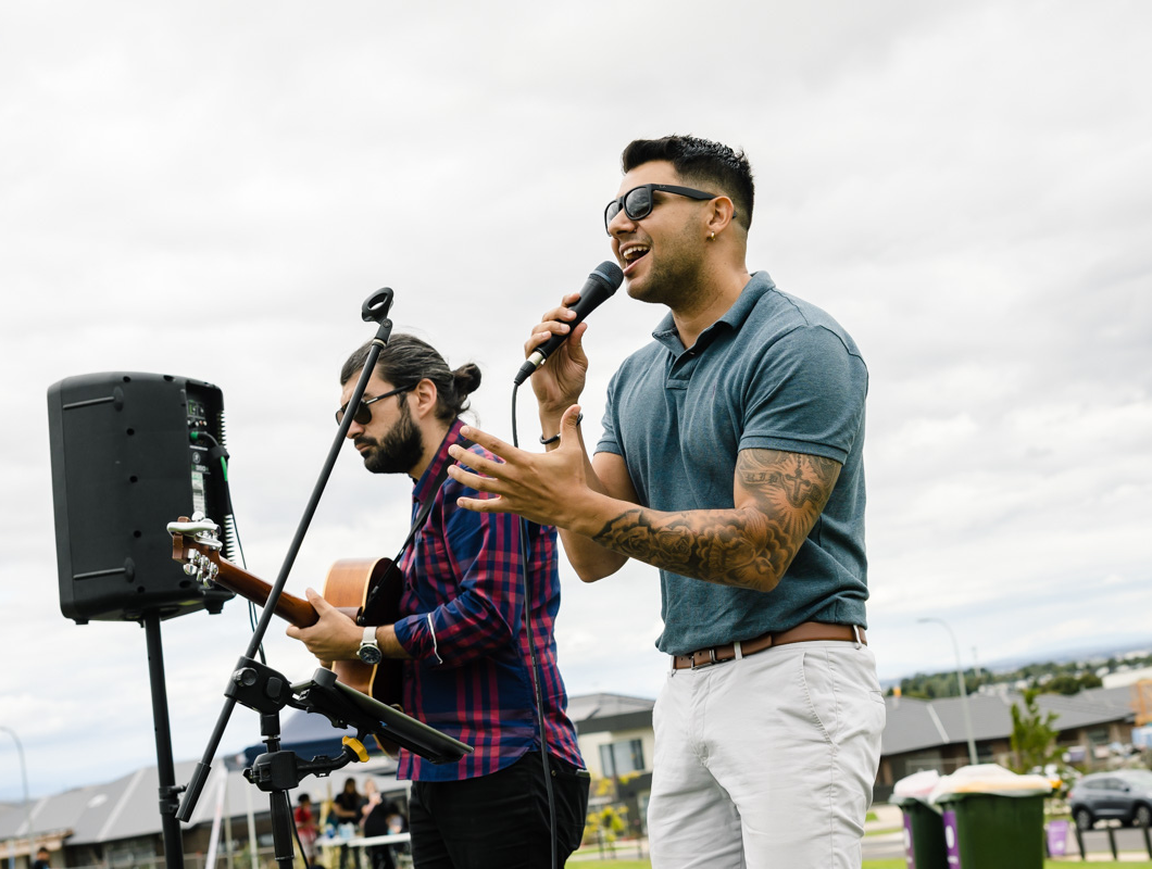 True North, Greenvale community event, two male musicians a singer and guitarist.