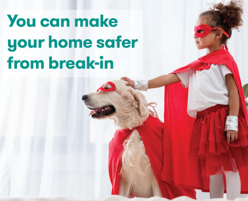 child and dog dressed as super heros