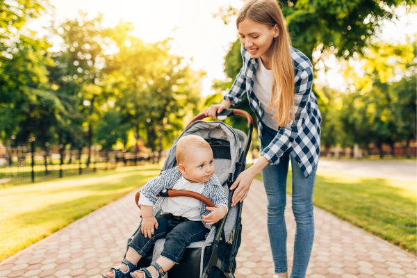 True North mother pushing child in pram