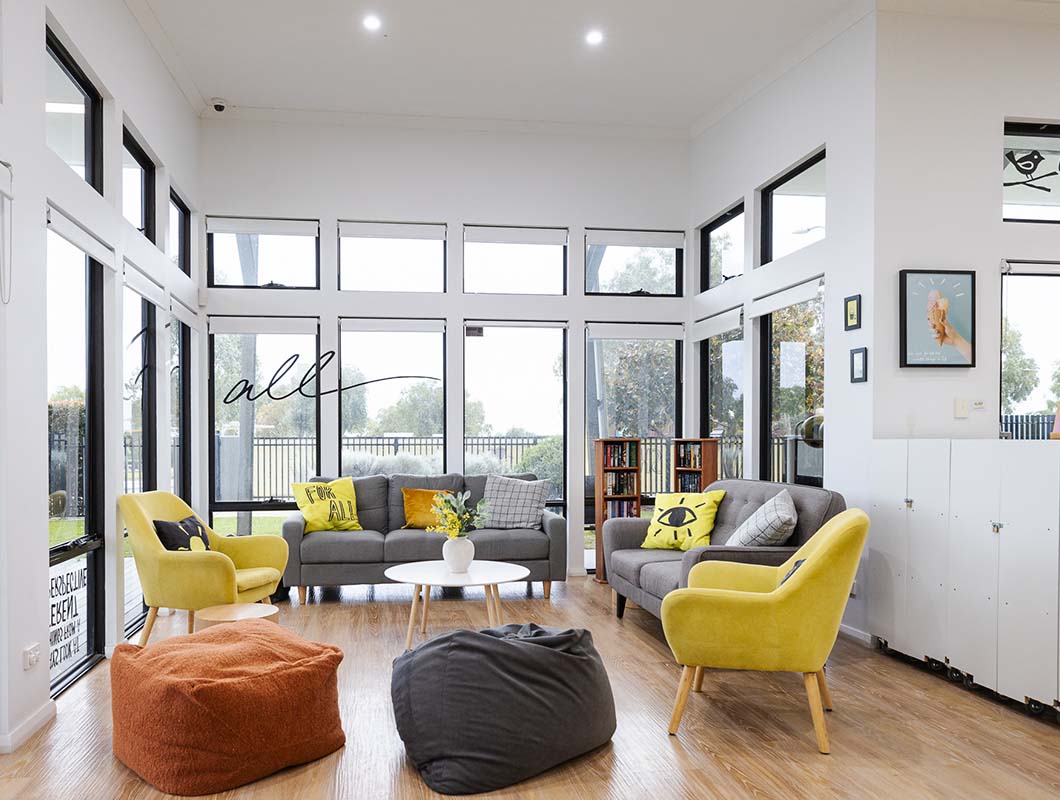 Allara, Eglinton revitalised hireable space 2023, couches, bean bags, coffee table and book cases space.