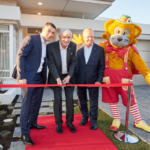 Fat Cat, Nigel Satterley, Kerry Stokes and Anthony Silvestro in front of the 2023 Telethon Home