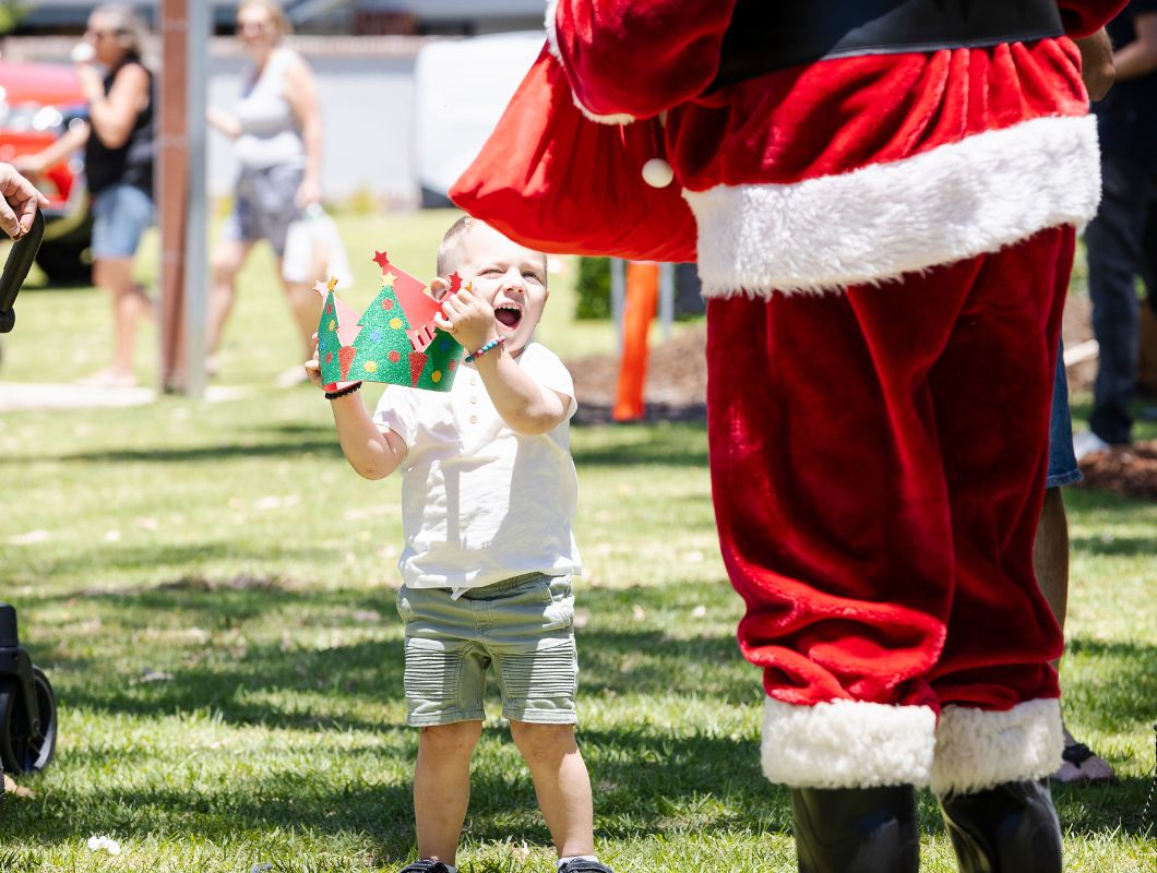 Santa Clause giving gifts at Clementine Upper Swan