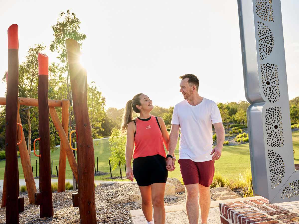 Young couple walking around Clementine in Upper Swan