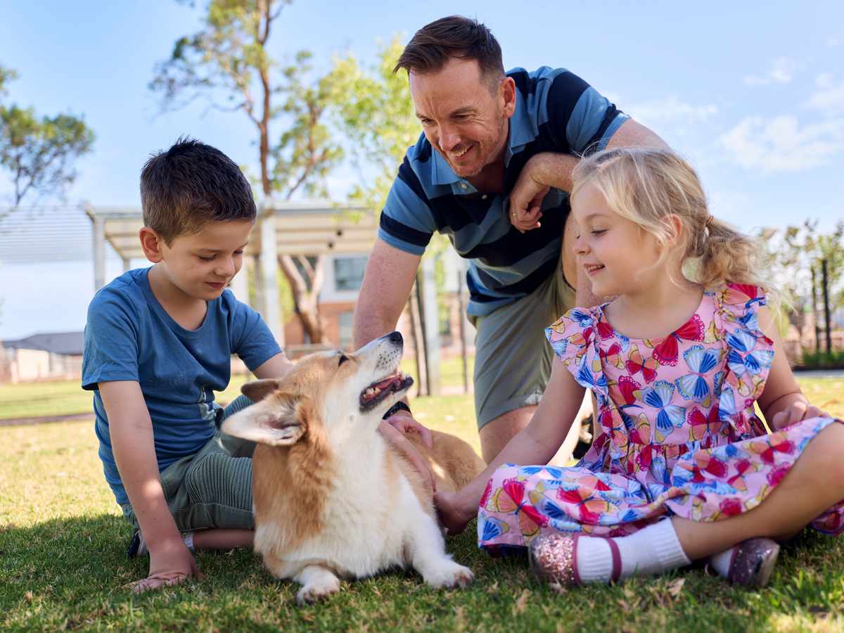 Clementine Upper Swan young father with young children playing with dog