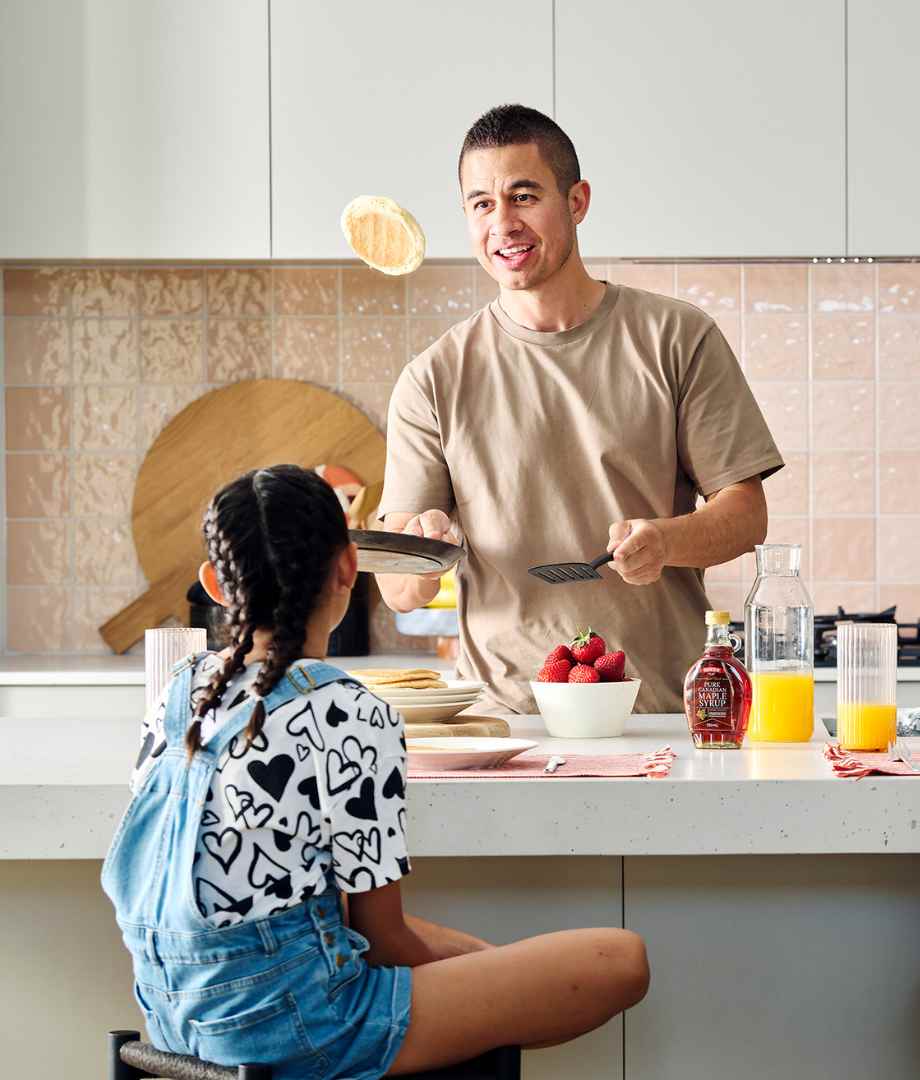 Young family cooking pancakes in Clementine Upper Swan