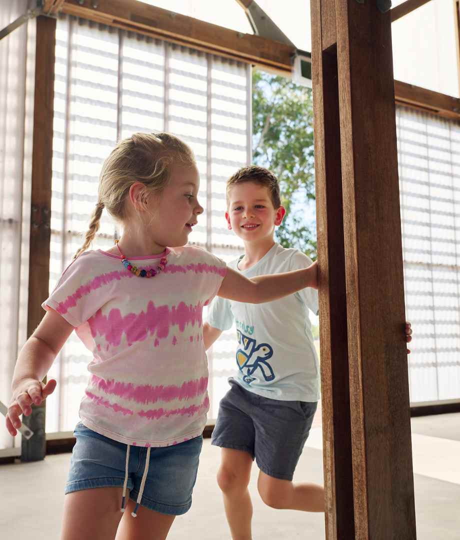 Young children running around the community space at Clementine in Upper Swan