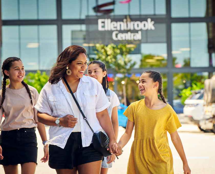 Mother and daughters walking to local shopping centre near Clementine estate