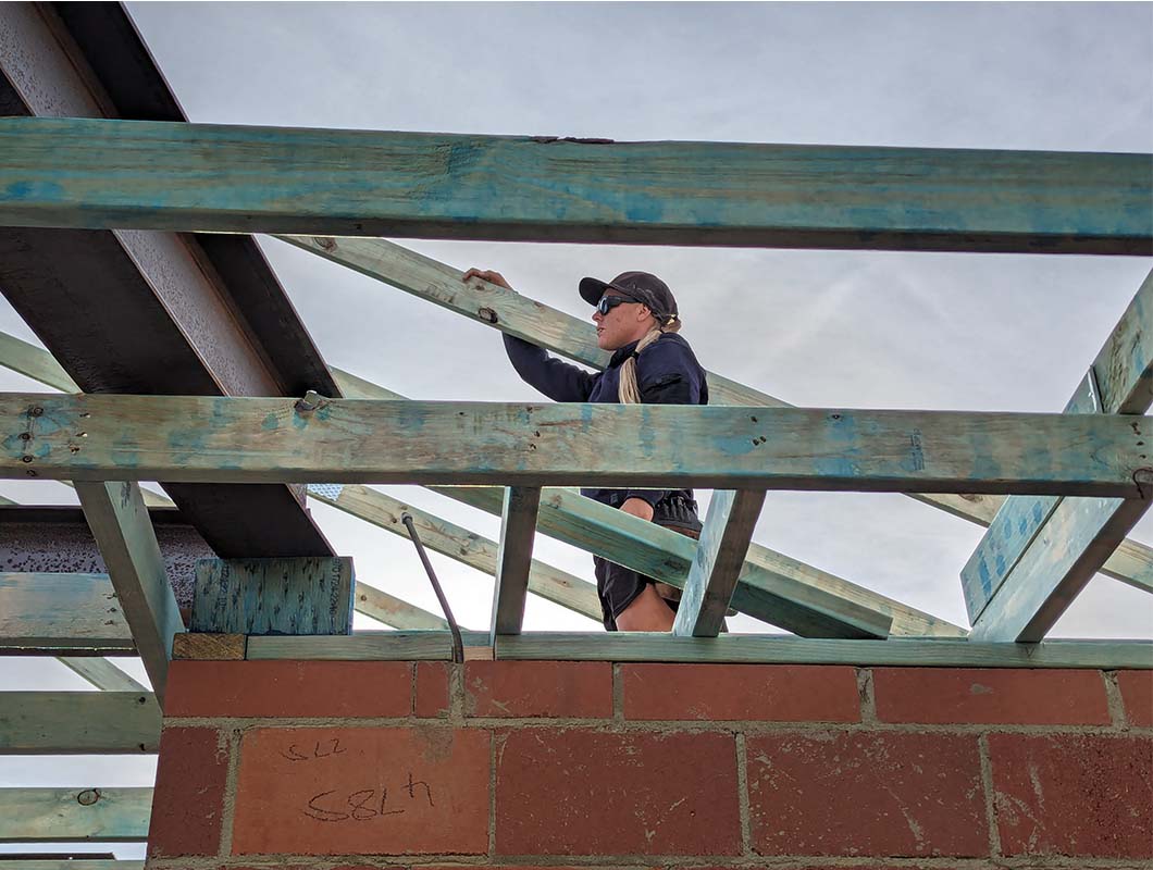Telethon home roof beams going in