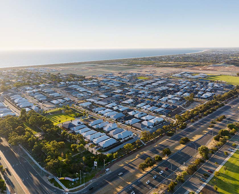 Seaside aerial shot of development from main road