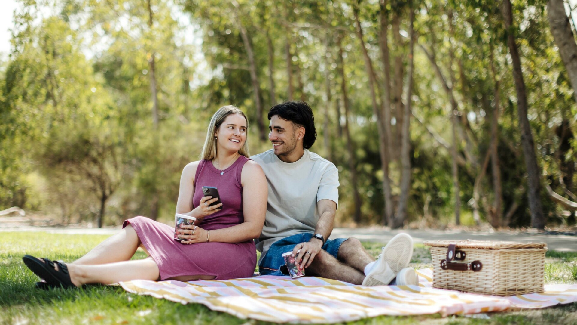 The Glades young couple enjoying a picnic