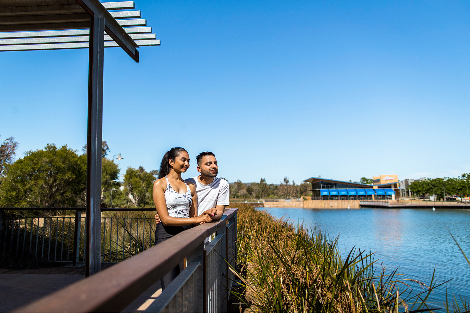The Glades, Byford young couple enjoying the lake views