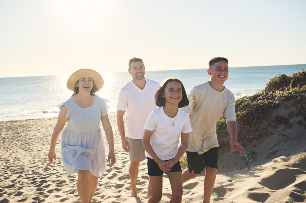 Family on a beach in Madora Bay, Seaside Estate